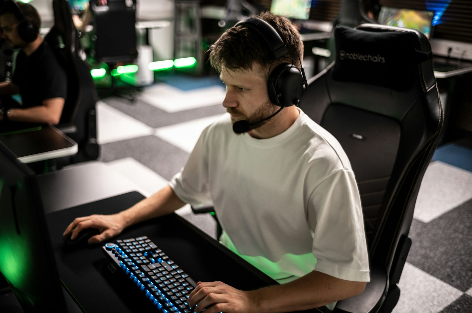 Photo of a person plaing a PC video game